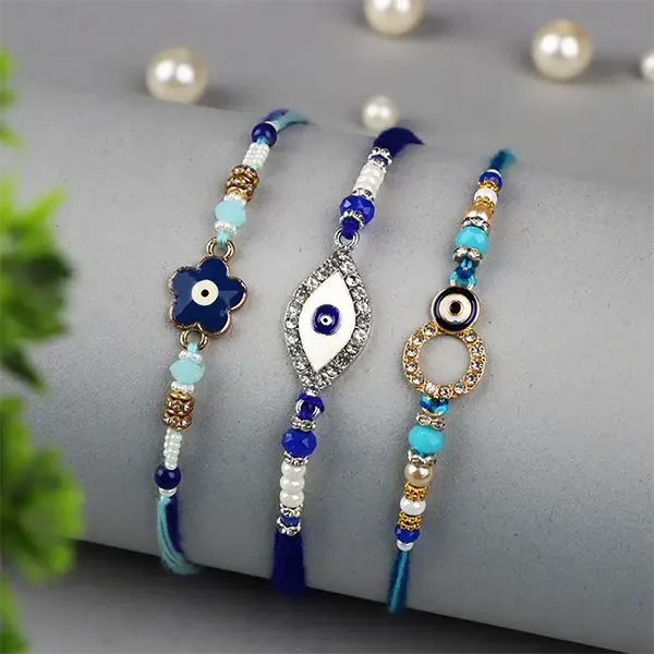 Stunning Set of 3 Blue Designer Rakhi with Complimentary Roli Chawal - For Finland