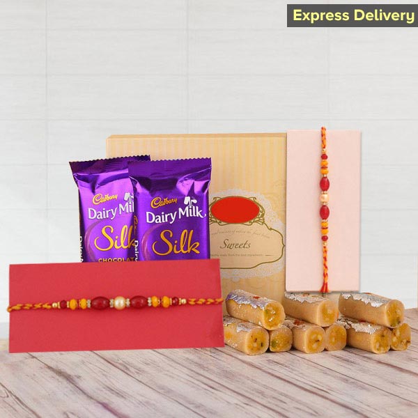 Two Pearl Rakhis with Sweet Delights