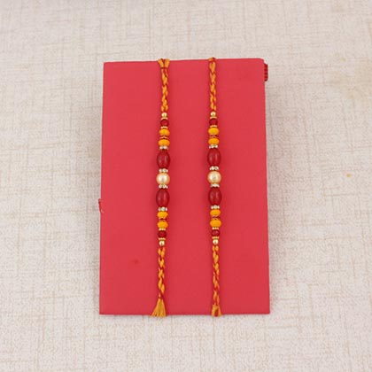 2 Pearl Rakhi with 500gm Mewa Bite