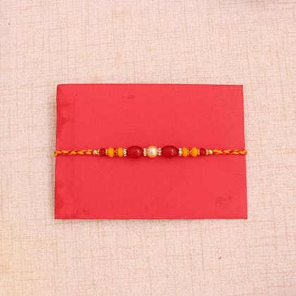 Pearl Rakhi with 1kg Mewa Bite