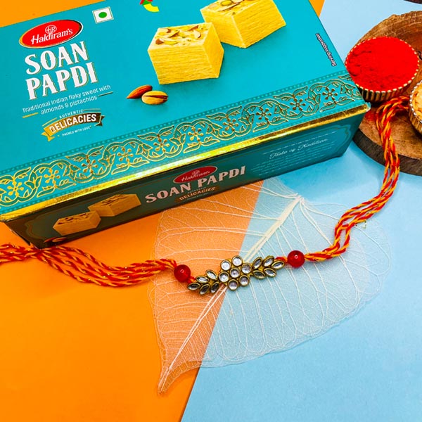 Red & Yellow Stone Rakhi With Soan Papdi