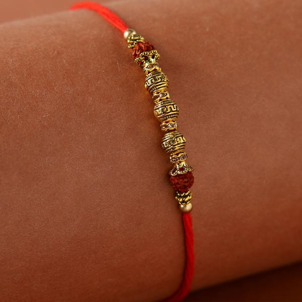 Rajasthani Style Golden Beads  Rakhi