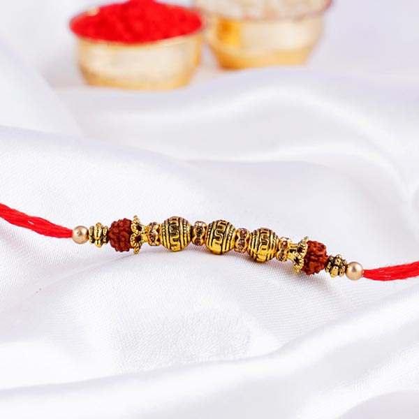 Rajasthani Style Golden Beads  Rakhi