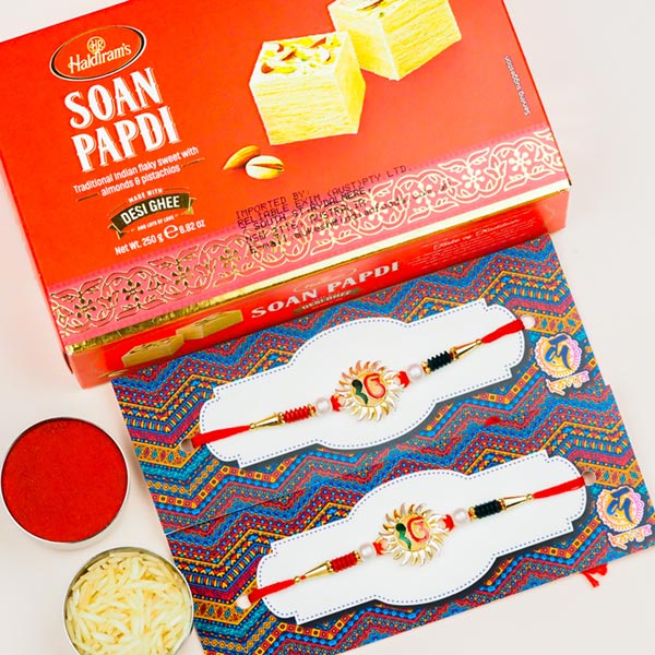 Collection Of 2 Ek Onkar Rakhis With Soan Papdi