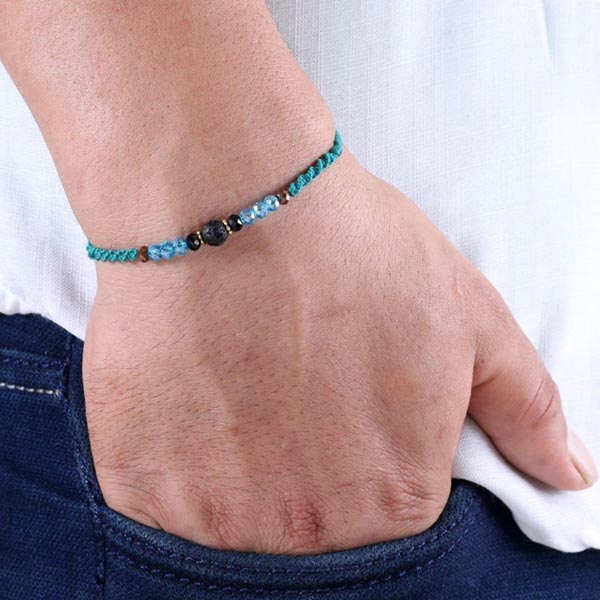 Lava Stone Rakhi in Blue Thread