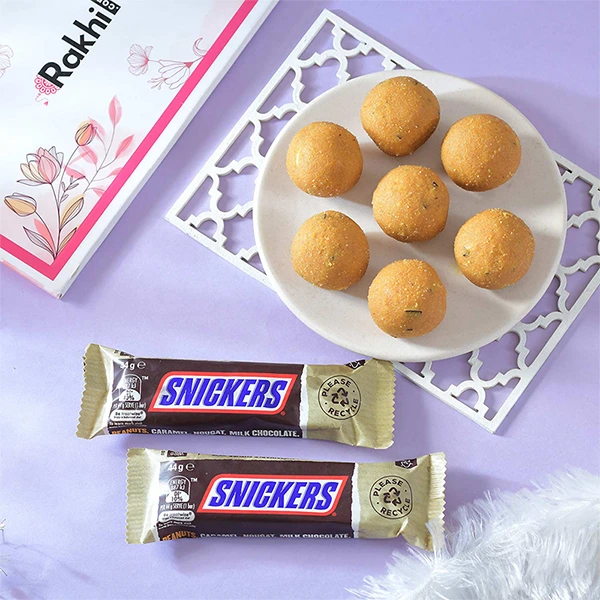 Alluring Single Rakhi with Besan Laddoo & Chocolates