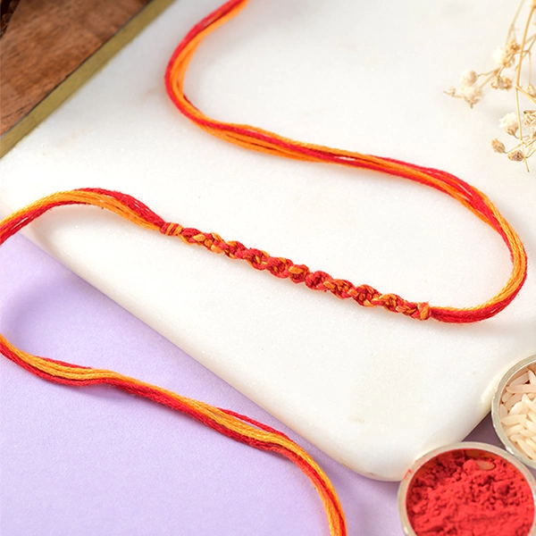 Thread Rakhi with Almond & Rocher