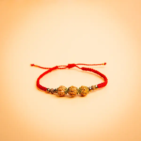 Premium Five Rudraksha Beads with Gold color Crystal Beads in Red Woven Thread