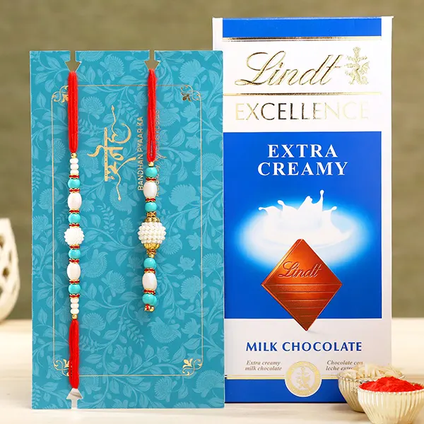 Blue Pearl And Lumba Rakhi Set With Lindt Exp - For Qatar