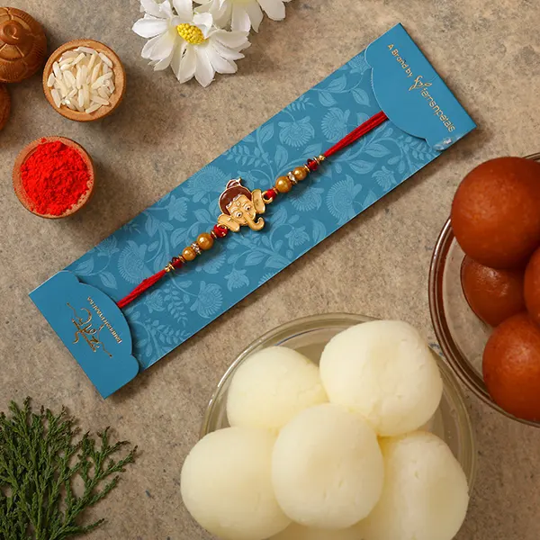 Ganesha Face Kids Rakhi With Gulabjamun And Rasgulla Exp - For Qatar