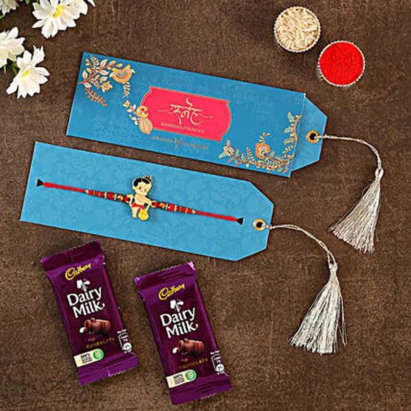 Ethnic Bal Hanuman Rakhi N Dairy Milk Chocolates - For Qatar