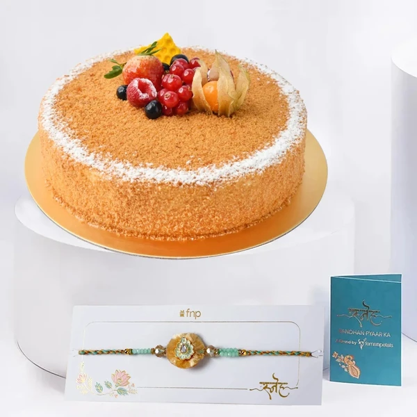 Delicious Honey Cake with Elegant Ethnic Rakhi Gift Set