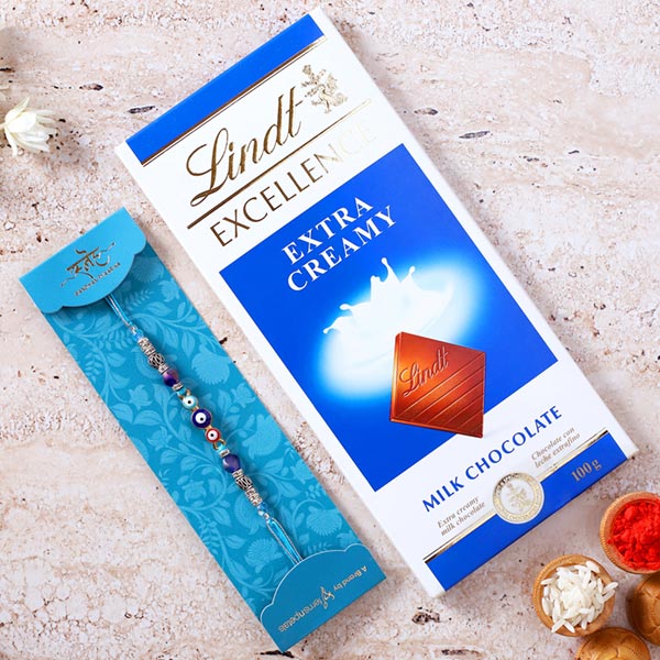 Auspicious Evil Eye Designer Rakhi And Lindt
