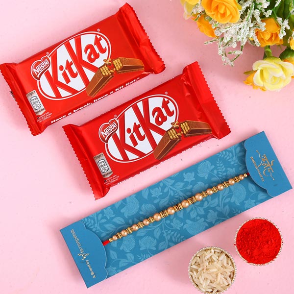 Traditional Pearl Mauli Rakhi And 2 Pcs Of Kitkat