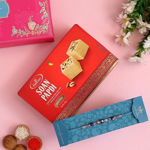 Auspicious Evil Eye Designer Rakhi And Soan Papdi