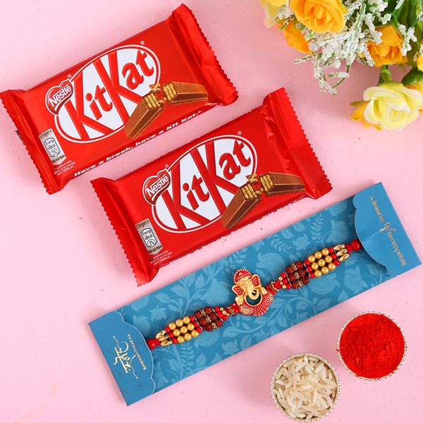 Ganesha And Rudraksha Rakhi With 2 Pcs Of Kitkat