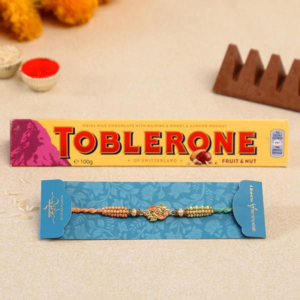 Ethnic Leaf Pearl Designer Rakhi And Toblerone Chocolate