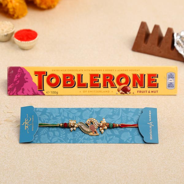 Beautiful Peacock Designer Rakhi And Toblerone Chocolate