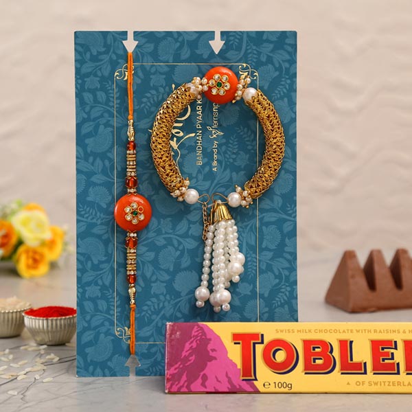 Orange Pearl And Lumba Rakhi Set With Toblerone Chocolate