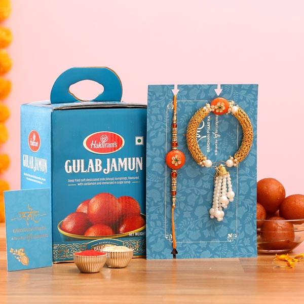 Orange Pearl Lumba Rakhi Set And Gulab Jamun