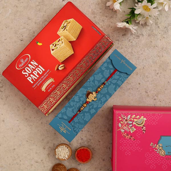 Long Trunk Bal Ganesha Kids Rakhi And Soan Papdi