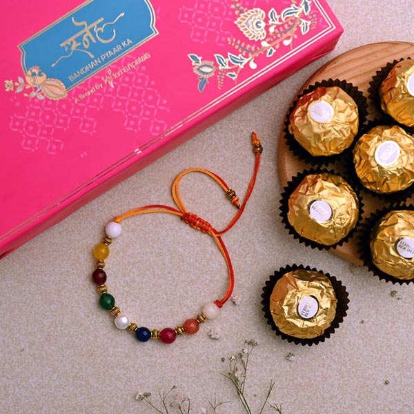 Navrattan Bracelet Pearl Rakhi And 3 Pcs Ferrero Rocher