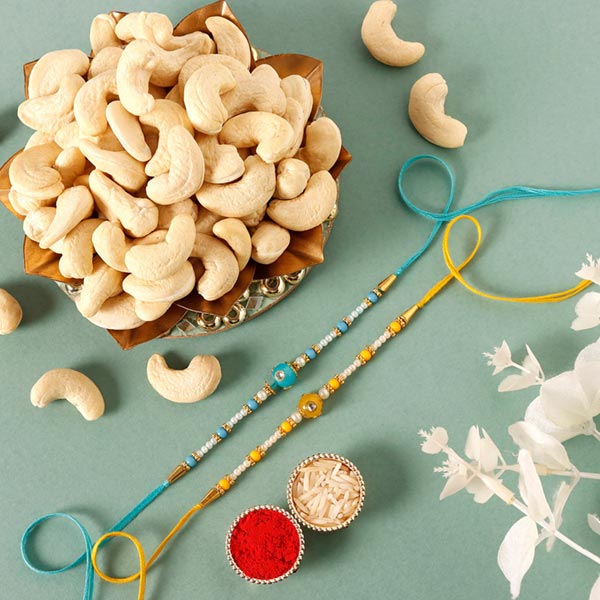 Sneh Vibrant Set Of 2 Pearl Rakhi & Cashews