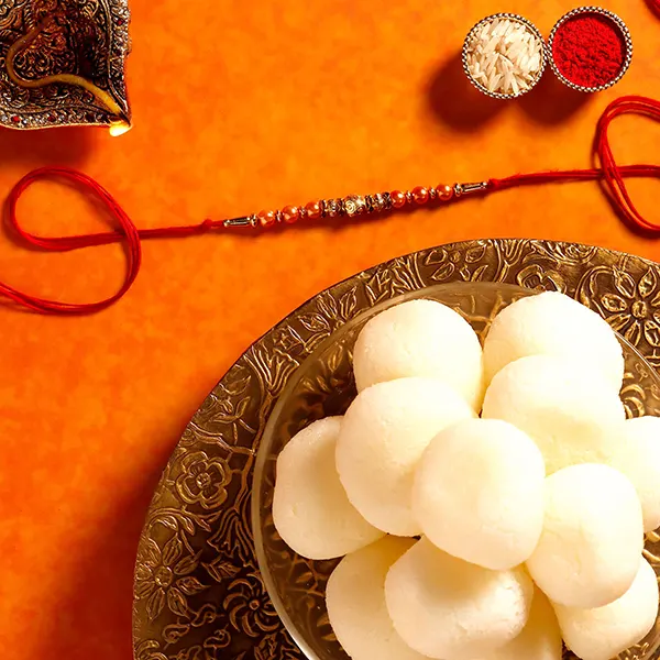 Rose Gold Rakhi & Rasgullas - For Qatar