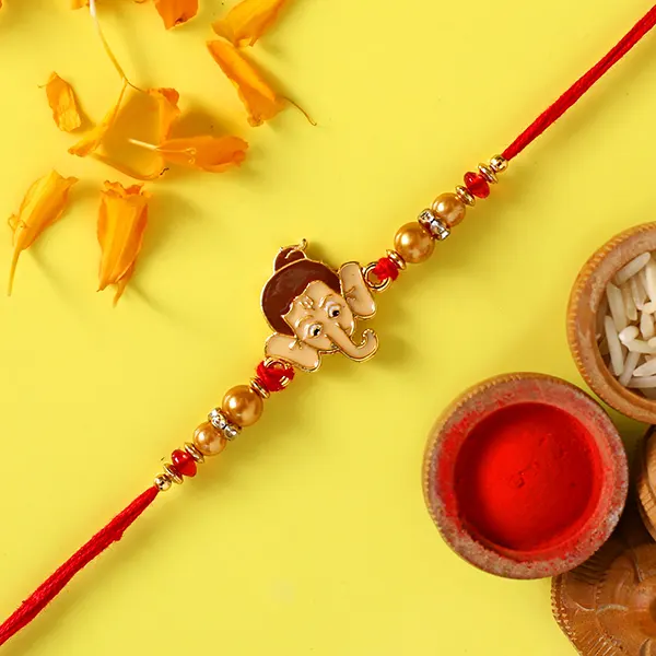 Long Trunk Bal Ganesha Pearl Rakhi For Kids With 3 Ferrero Rocher - For Qatar