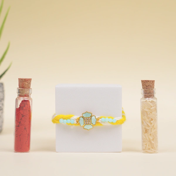Elegant Yellow Thread Floral Design Rakhi with Roli Chawal