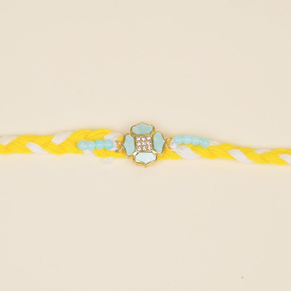 Elegant Yellow Thread Floral Design Rakhi with Roli Chawal