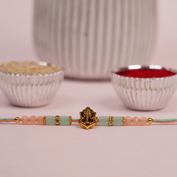 Divine Ganesha Colourful Thread Rakhi with Roli Chawal