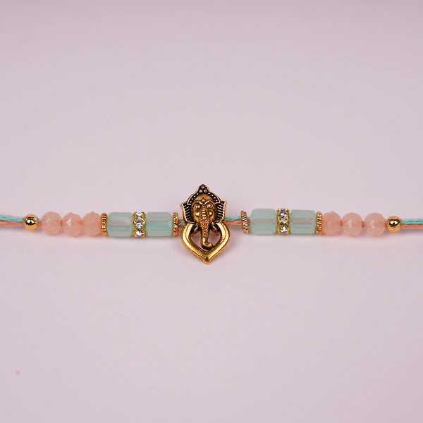 Divine Ganesha Colourful Thread Rakhi with Roli Chawal