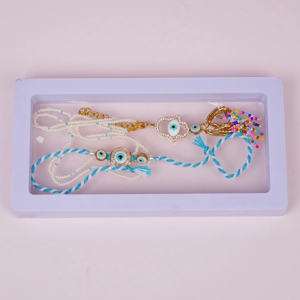Stylish Blue Evil Eye Couple Rakhi Set for Bhaiya Bhabhi