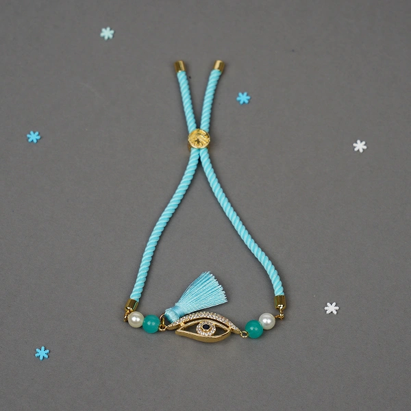 Elegant Blue Lumba Rakhi with Roli Chawal