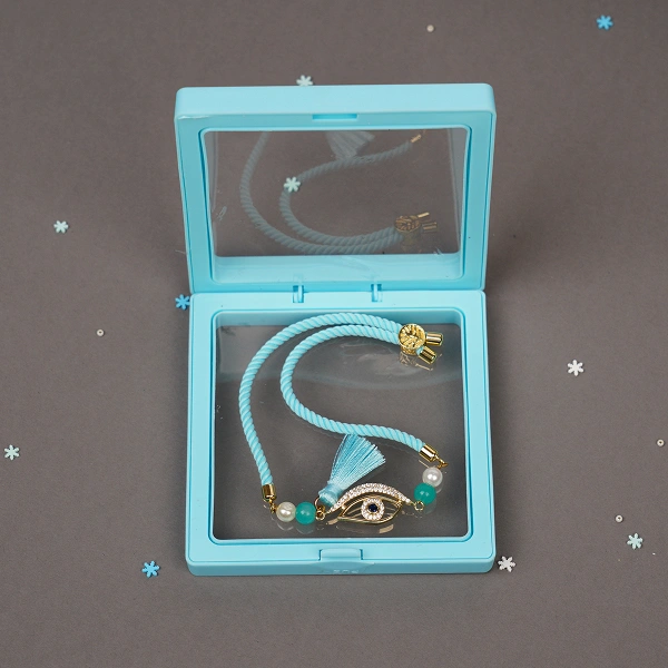 Elegant Blue Lumba Rakhi with Roli Chawal
