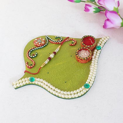 Leaf Shaped Thali with Beaded Rakhi