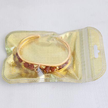 Golden Om & Rudraksha Bracelet Rakhi