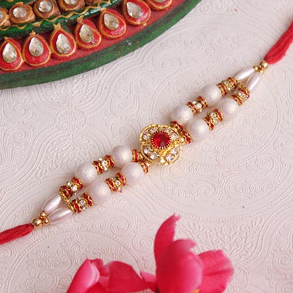Beautiful Pearl Rakhi with Stones
