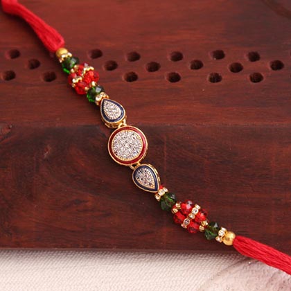 Scintillating AD Stone Rakhi