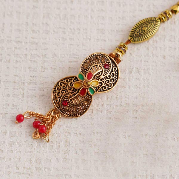 Enticing Golden Bhaiya Bhabhi Rakhi Set