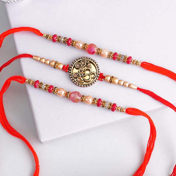 Eye-catchy golden Rakhi set of 3