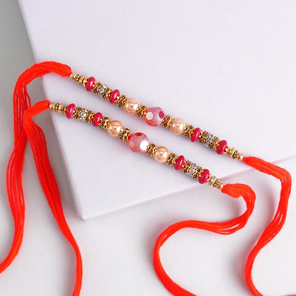 Eye-catchy golden Rakhi set of 3