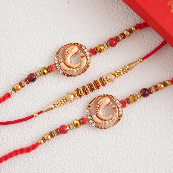 Splendid set of 3 divine golden Rakhi