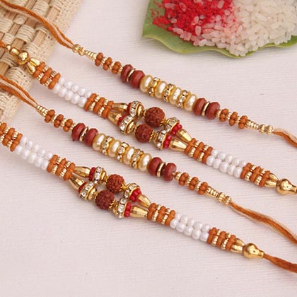 Eye-catchy auspicious set of 4 Rakhi