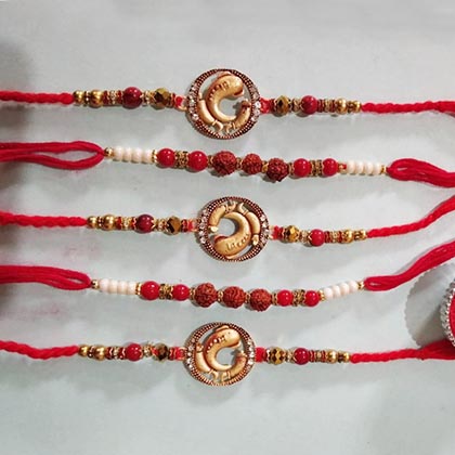 Pretty golden Rakhi set of 5