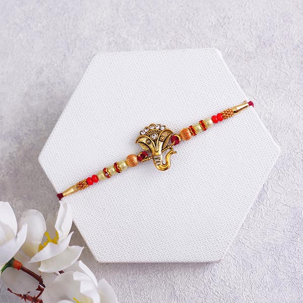 Ganesha Rakhi with Chocolates Combo
