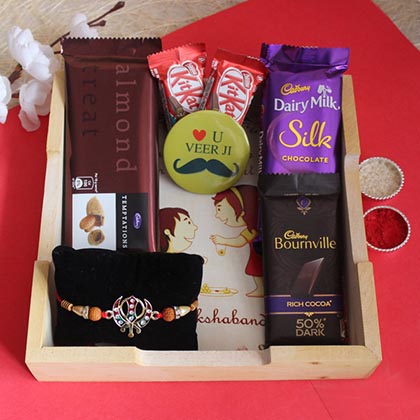 Adorable Rakhi & Chocolates Combo