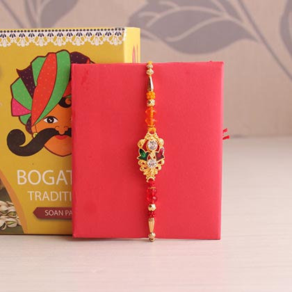 Scrumptious Golden Rakhi Combo