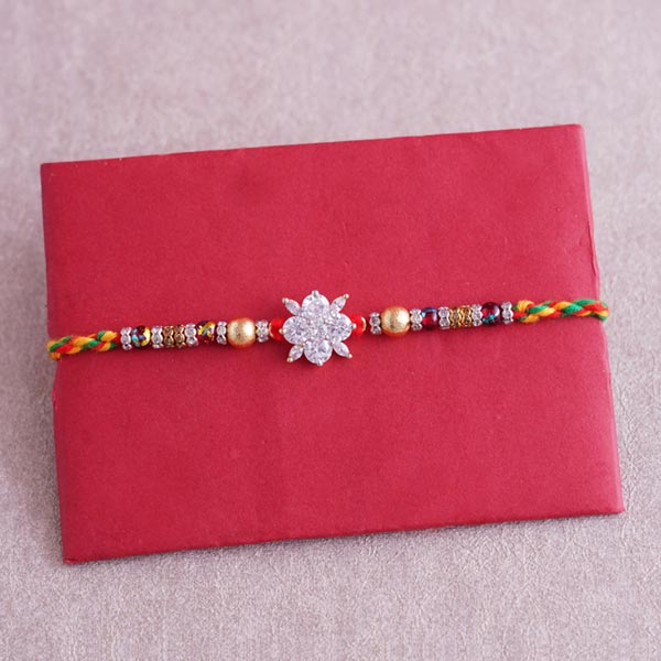 Scintillating Pearl Rakhi with Kaju Kalash Sweets